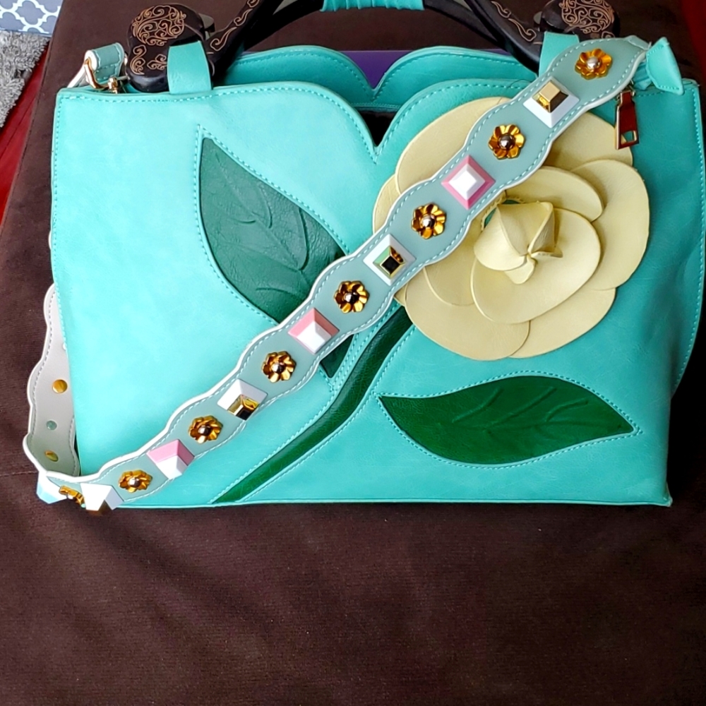 Turquoise leather purse with embellished strap